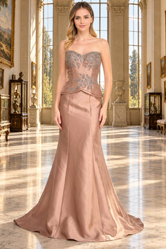Amelia Couture 2162 mocha-colored strapless evening gown with a beaded bodice and a peplum waist.