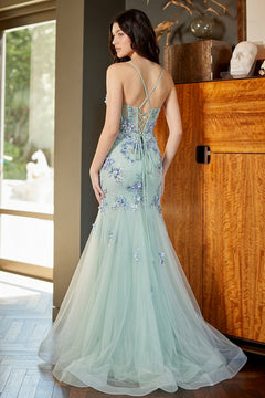 Amelia Couture 2164 is a light green, floor-length mermaid prom dress with spaghetti straps, a lace-up back, and blue sequin flower appliques.