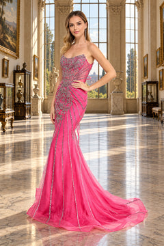 Amelia Couture 2165 is a strapless, floor-length hot pink mermaid prom dress featuring intricate silver beadwork.