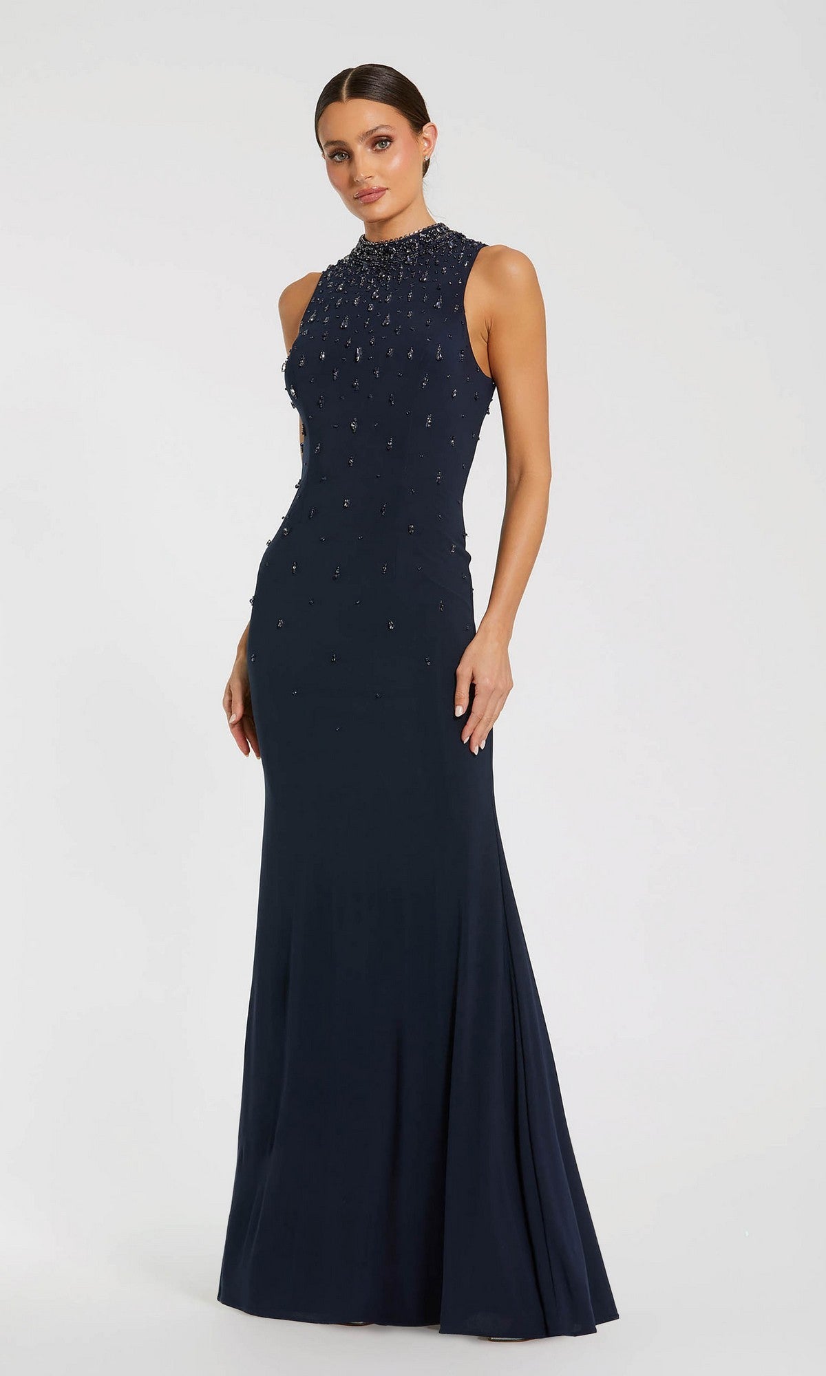 A woman wears the High-Neck Long Black Formal Gown, Mac Duggal 2260, standing against a plain white background.