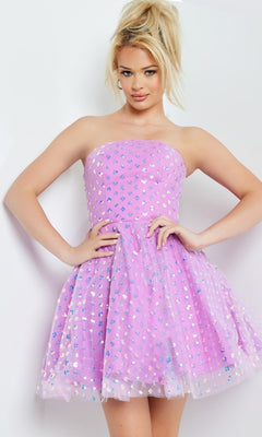 A woman stands against a white background wearing the Jovani Short Purple Strapless Party Dress 22815, featuring a flared skirt and iridescent sequin accents.