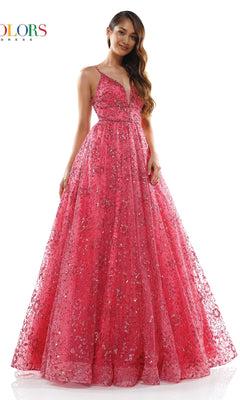 A woman wears the Long Glitter Princess Prom Ball Gown 2288, a bright pink, floor-length mesh gown with sequin embellishments, standing against a white background.