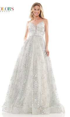A woman wearing the Long Glitter Princess Prom Ball Gown 2288—a silver, floor-length, sleeveless sequin mesh dress—stands smiling against a white background.