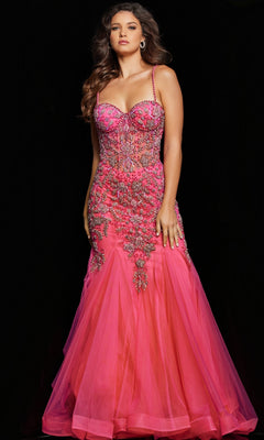 A woman poses against a black background in the Jovani Beaded Sheer-Bodice Long Prom Dress 23125, a fitted bright pink mermaid gown with intricate beading and sheer detailing.