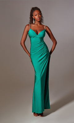 A woman in the Beaded-Straps Long Prom Dress: Aerie Couture 231, a stunning green evening gown.