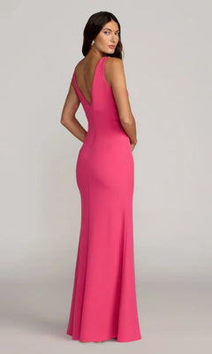 A woman models the Mac Duggal 2371, a sleeveless, fitted, floor-length pink crepe formal dress with a deep V-back, looking over her shoulder against a plain background.