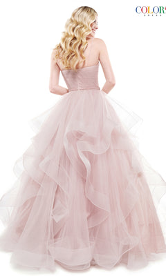 Woman with long wavy blonde hair, seen from the back against a white background, wears the Layered Long Tulle Prom Ball Gown 2381—a sleeveless, light pink dress with an A-line layered tulle skirt.