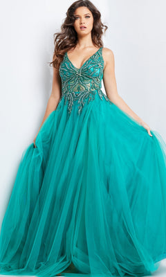 A woman models the Jovani Beaded-Bodice Long Prom Ball Gown 23962 in teal, featuring a sleeveless design, beaded bodice, and full tulle skirt, standing against a plain white background.