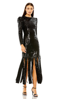 A woman models the Mac Duggal 24008 midi black sequin formal dress—featuring long sleeves, multiple front slits, and paired with high-heeled sandals—against a white background.