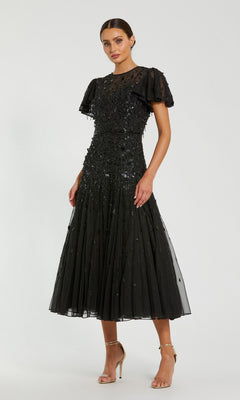 Woman wearing a Mac Duggal 24018 brown tea-length party dress, posing against a plain background.
