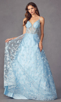 A woman in the Sheer-Corset Glitter-Print Long Prom Dress 2413, a light blue sleeveless A-line gown with floral lace details and a sheer bodice, stands against a gray background, holding out part of her skirt.