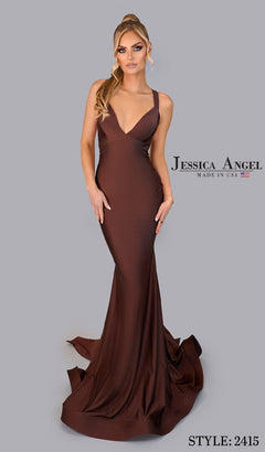 A woman models the fitted, floor-length Backless Prom Dress with Train: Jessica Angel 2415 in brown, featuring straps and a subtle train, against a plain gray backdrop. Stylish choice for prom. Text: “Jessica Angel” and “Style: 2415.”.