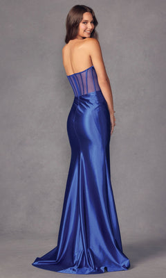 A woman smiles in the Strapless Illusion Long Formal Prom Dress 2416, a fitted, floor-length royal blue satin gown with a sheer corset back, posing against a plain gray backdrop.