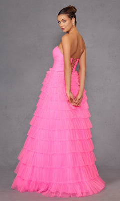 A woman in the Long Prom Dress JT2456H by Juliet, featuring a pink empire waist design.
