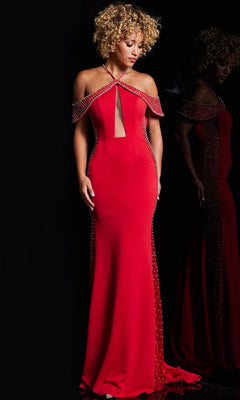 A woman with curly blonde hair wears the Jovani Sheer-Illusion-Sides Long Prom Dress 24611—a red, fitted off-the-shoulder gown with beaded details and a front cutout—standing against a black background.