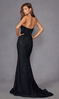 A woman stands with her back to the camera, wearing the Strapless Long Sequin Prom Dress: Juliet JT2472R in black, featuring a shimmering, floor-length silhouette against a gray backdrop.