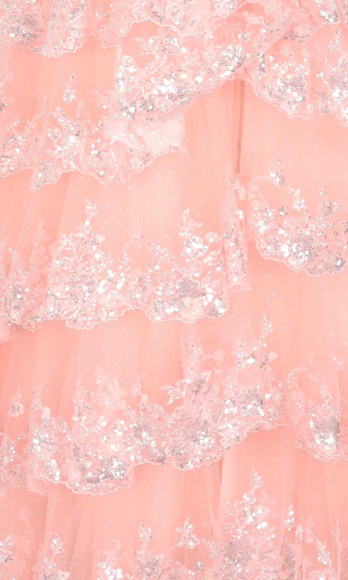 Close-up of the A-Line Corset Lace Prom Dress (PromGirl 250005), showcasing layered peach fabric with silver sequin floral embroidery and scalloped edges—an elegant choice for an off-the-shoulder prom look.