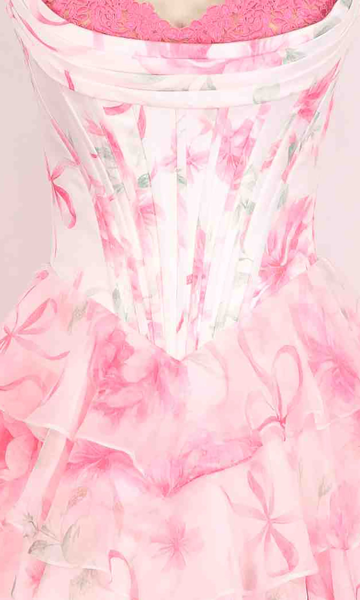 Close-up of the Floral Prom Ball Gown: PromGirl Exclusive 250123D, featuring pink and white florals, sheer ruffled layers, visible boning, and a pink lace undergarment.