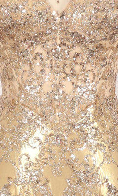 Close-up of a gold dress with intricate beadwork and sequins