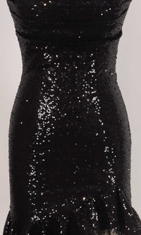 Closeup view of a black sequin dress fabric.