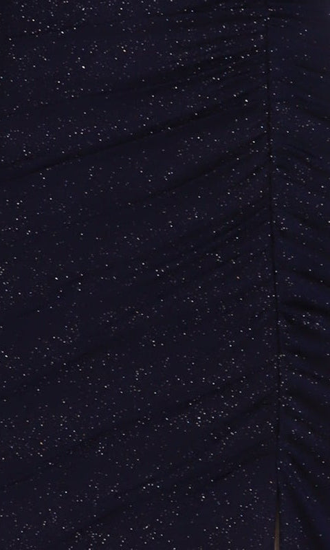 Close-up of dark blue ruched fabric with a glittery texture and gathered seam—stylish details found on the Mini Glitter Hoco Dress: PromGirl Exclusive 250150, perfect for homecoming.