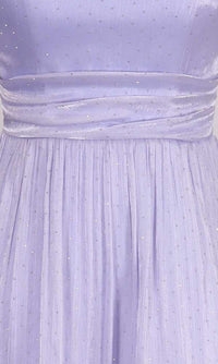 Close-up of a light purple dress with rhinestone embellishments