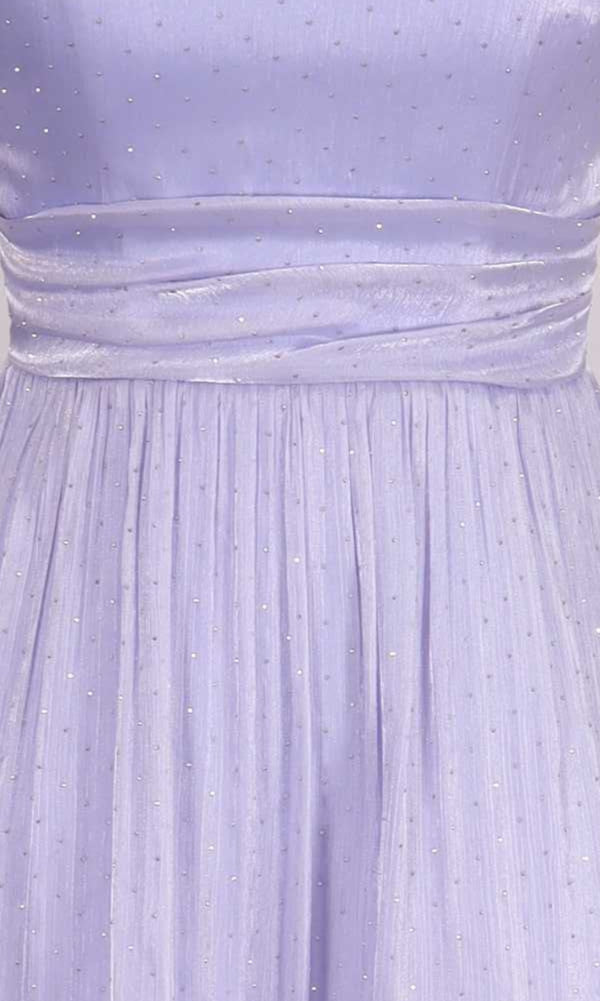 Close-up of a light purple dress with rhinestone embellishments