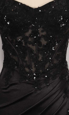Close-up of a black dress with sequin detailing on a sheer corset bodice.