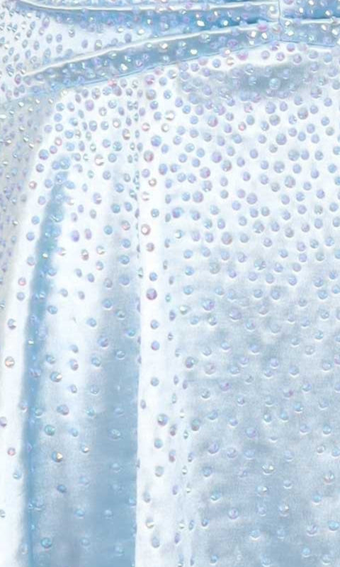 Close-up of a light blue dress fabric swatch with heat-set stone embellishments.