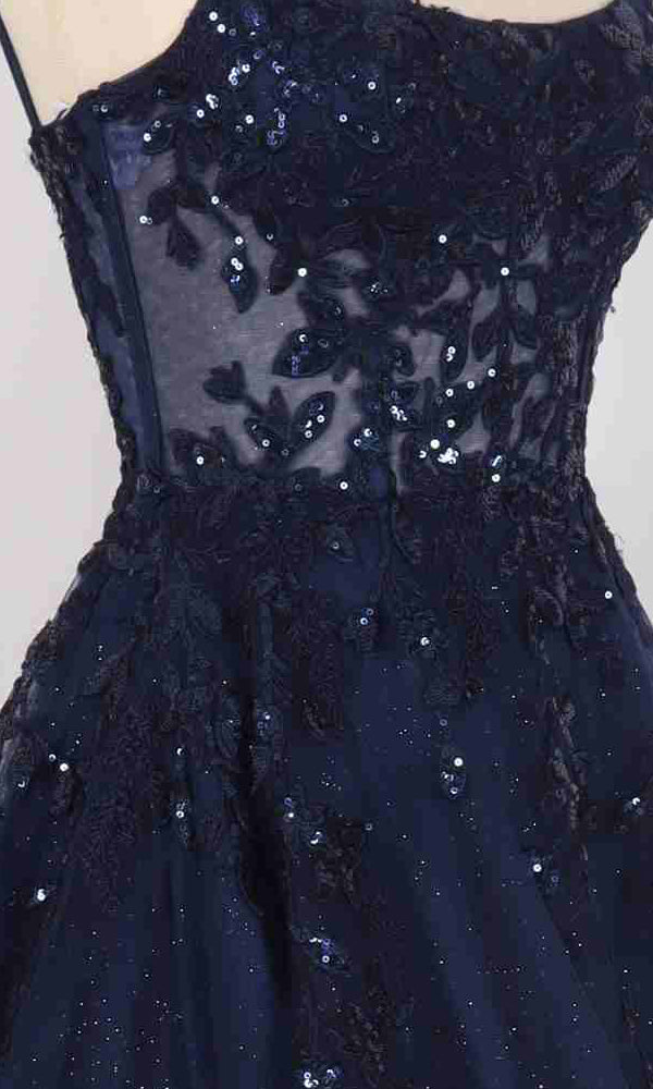 Close-up of the Long Prom Dress: PromGirl Exclusive 250245, a navy blue strapless gown with sheer mesh, floral sequin lace embroidery, and an adjustable lace-up back.