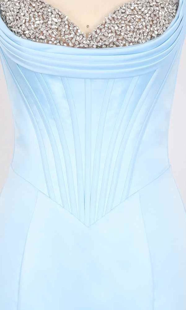 Close-up of the PromGirl Exclusive 250299: a strapless light blue satin mermaid prom dress with structured vertical seams and a silver beaded sweetheart neckline.