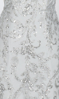 Close-up of the PromGirl Exclusive 250343 short homecoming dress featuring intricate silver sequin and bead embroidery in a leafy pattern on a light background—ideal for a sleeveless mini look.