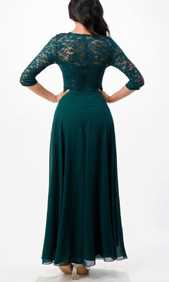 Model in Sleeved V-Neck Long A-Line Formal Dress 25434, featuring dark green sequin-lace, rhinestone waist detail, and three-quarter sleeves, shown from the back against a white background.