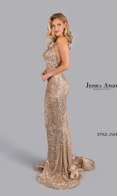 A woman poses against a gray background in the Backless Long Sequin Prom Dress: Jessica Angel 2564—a floor-length, gold, backless gown with thin straps, a fitted silhouette, and a short train.