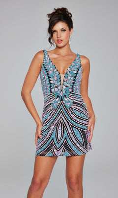 A woman models the Jovani Short Beaded V-Neck Homecoming Dress 25925, a sleeveless mini with blue, pink, black, and silver sequins in a striking geometric pattern, standing against a plain gray background.