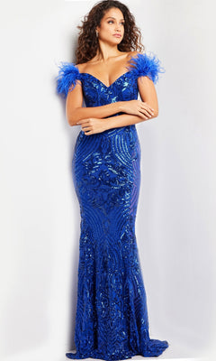 A woman poses against a plain white background in the Jovani Feathered Long Sequin Prom Dress 26041, a fitted, off-the-shoulder royal blue gown featuring sequin details and feathered sleeves.