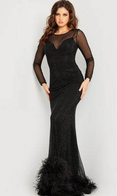 A woman models the Jovani Long Sleeve Long Black Formal Dress 26047, featuring mesh sleeves, a sheer neckline, and feather-accented hem, set against a plain light background.
