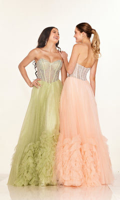 Two women wear Long Prom Dress Cecilia Couture 2617—one in pale green with an a-line tulle skirt, the other in light peach with a rhinestone corset bodice—as they stand side by side, smiling against a plain background.