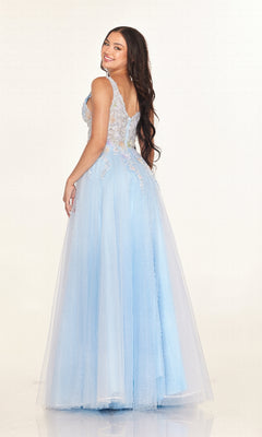 A woman with long brown hair models the Cecilia Couture 2619 long prom dress in light blue, featuring sheer lace details and delicate floral embroidery, smiling over her shoulder against a plain white background.