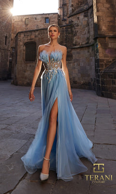 A woman in a blue Terani 261P6631 long formal dress with a high slit walks on a stone street in front of an old building.