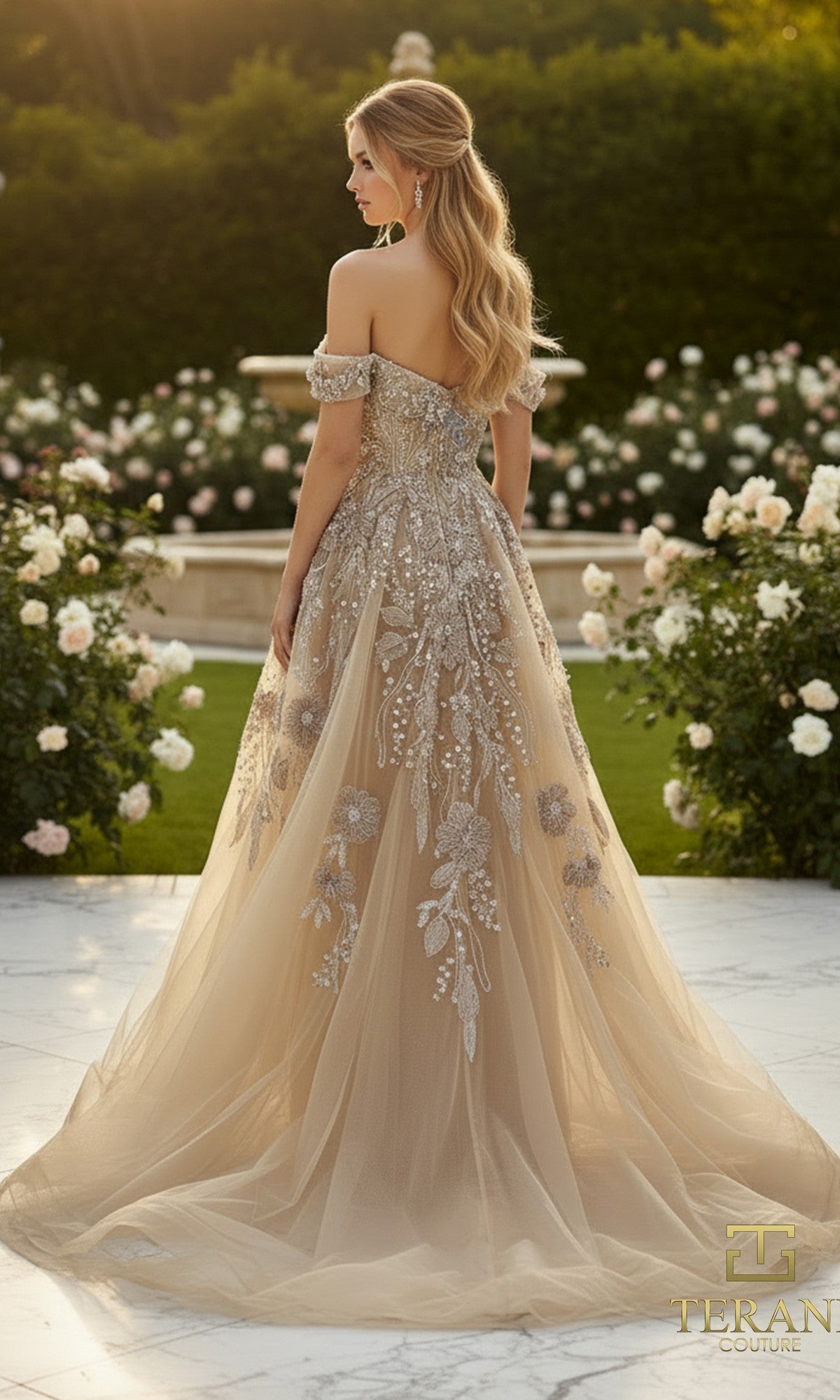 A woman in the Terani 261M6435 long formal dress stands on a marble terrace near a garden of blooming roses, facing away from the camera.