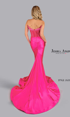 A blonde woman models the Jessica Angel 2620 Strapless Corset Prom Gown in bright pink, showcasing a fitted, ruched bodice and mermaid silhouette with a long train, viewed from the back.