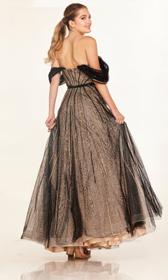 Woman wearing the Cecilia Couture 2621 long prom dress, featuring off-the-shoulder style, floor-length silhouette, and black and gold sequin embellishments, stands looking over her shoulder against a plain background.