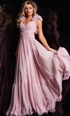 A woman poses against a dark background, holding out one side of her Jovani Ruffle-Strap Long Metallic Prom Dress 26248, which features elegant ruffled shoulder details and a flowing silhouette.