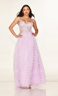 A woman wears the Cecilia Couture 2624 long prom dress—a lilac, tiered ruffle A-line gown with a fitted, embellished bodice and thin straps—against a plain light background.