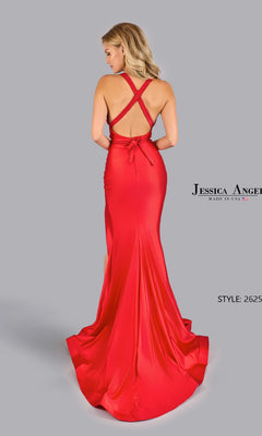 A woman wears the Jessica Angel 2625 Convertible Long Prom Dress, a floor-length bright red gown with a crisscross open back and fitted silhouette, posing against a plain gray background.