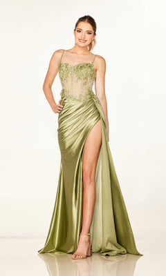 A woman models the Cecilia Couture 2627 long prom dress in light green satin, featuring a high leg slit, sheer floral bodice, and strappy heels, posed against a plain white background.