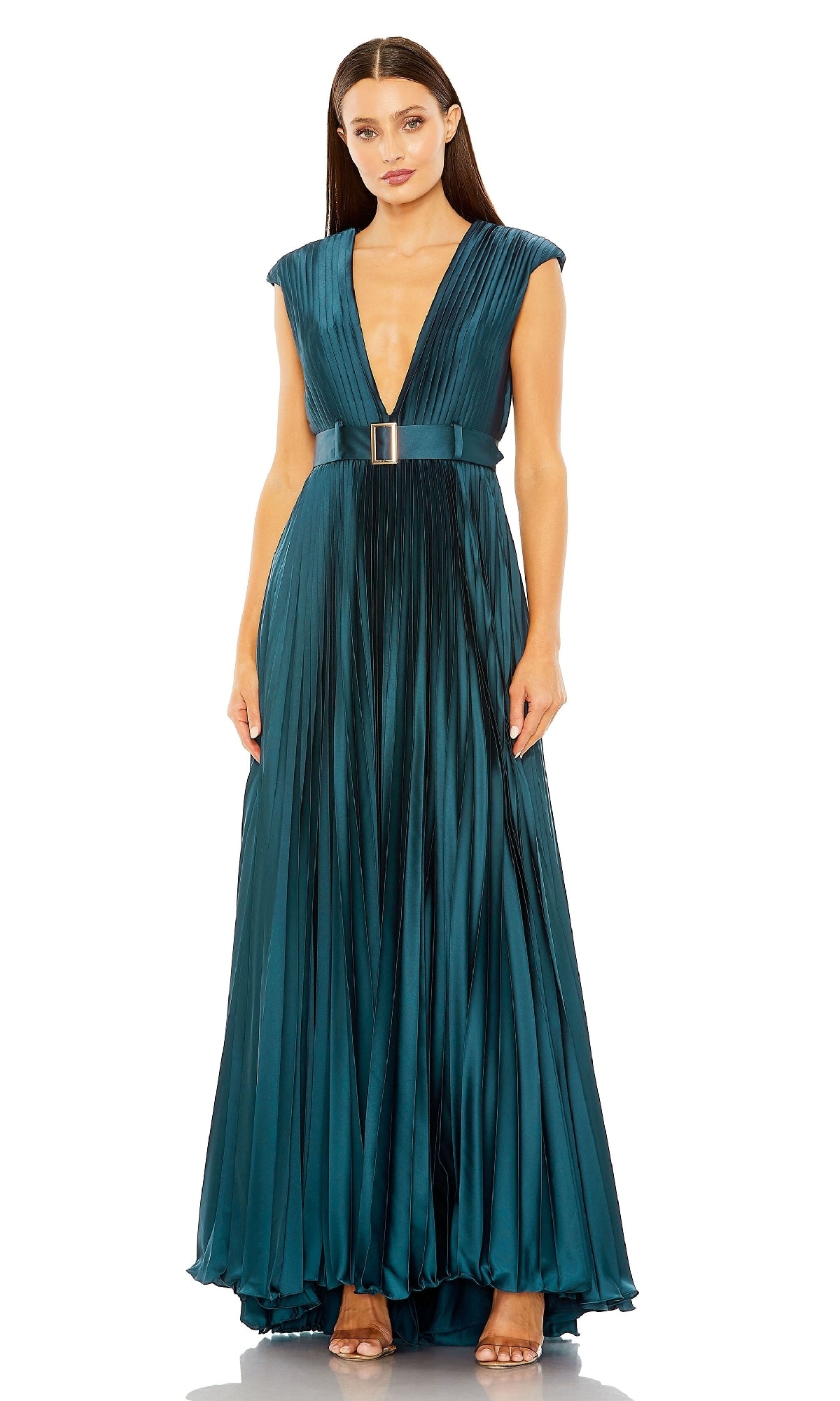 A woman wears the Mac Duggal 26285 V-Neck Belted Pleated Formal Dress in deep teal, featuring a floor-length silhouette, plunging neckline, cap sleeves, and a belted waist—an elegant choice for any special occasion.