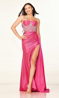 A woman stands confidently with one hand on her hip, smiling in the Cecilia Couture 2628 long prom dress—bright pink with beaded embellishments, a floor-length skirt with thigh-high slit, and delicate spaghetti straps.