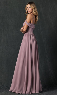 A woman wearing the Juliet 262 long prom dress in mauve, featuring an off-the-shoulder a-line design, stands sideways against a dark, textured background.